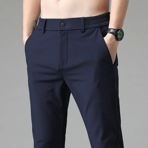 Calça Social Masculina Montvani MV203, com corte slim fit e tecido de nylon e spandex, perfeita para eventos formais, corporativos ou uso diário.