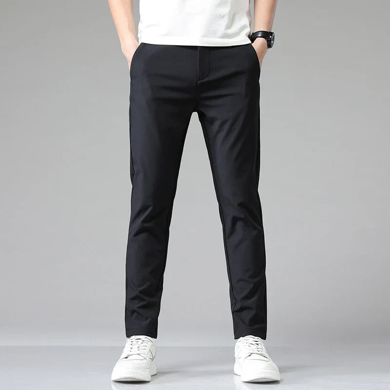 Calça Social Masculina Montvani MV203, com corte slim fit e tecido de nylon e spandex, perfeita para eventos formais, corporativos ou uso diário.